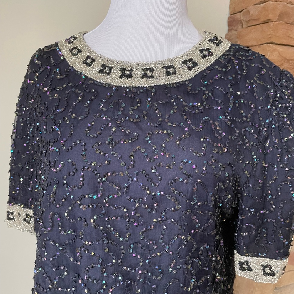 Evening 100% silk beaded navy blouse. Silver and navy floral design.